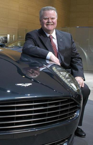 Jim Padilla, President and Chief Operating officer, Ford Motor Company with the Aston Martin Rapide concept vehicle at the 2006 North American International Auto show in Detroit.